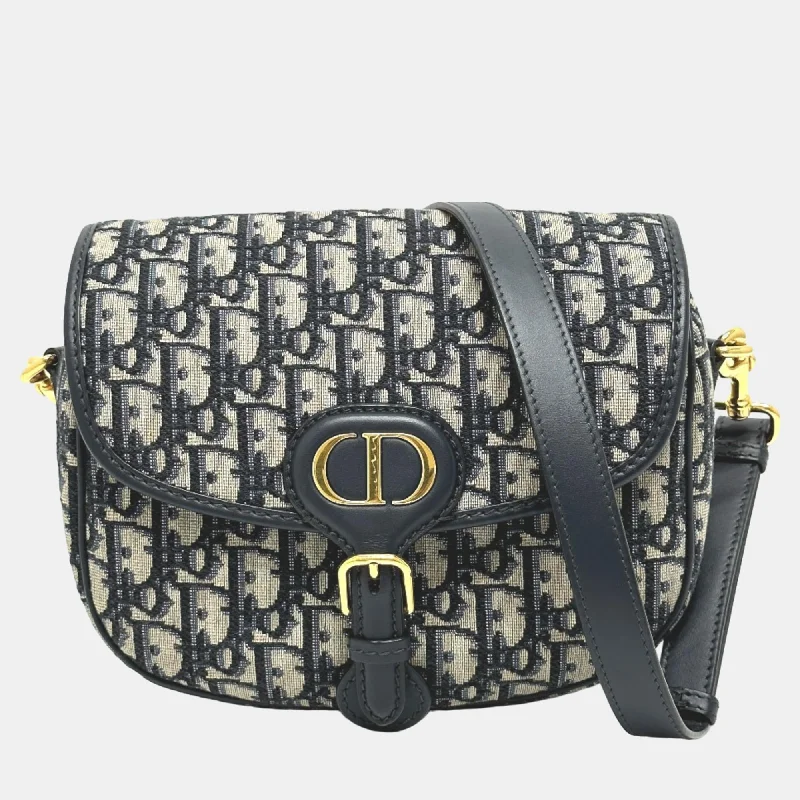 Bags With Tsa-Approved Features Navy Blue Oblique Canvas Medium Bobby Flap Crossbody Bag Bags With Tsa-Approved Features Navy Blue Oblique Canvas Medium Bobby Flap Crossbody Bag